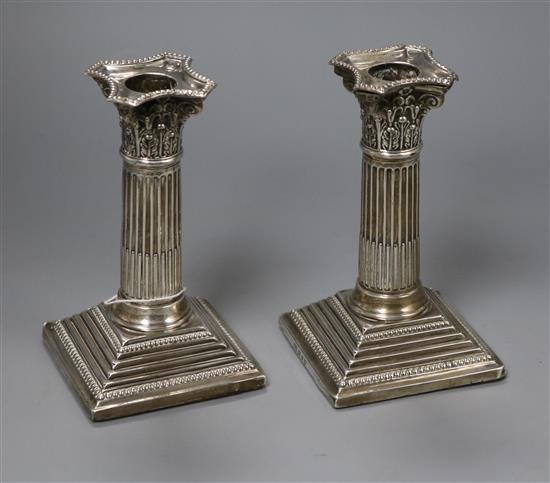 A pair of late Victorian silver dwarf candlesticks, 15.7cm.